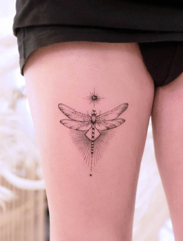 Sun and dragonfly thigh tattoo by @fda__lights