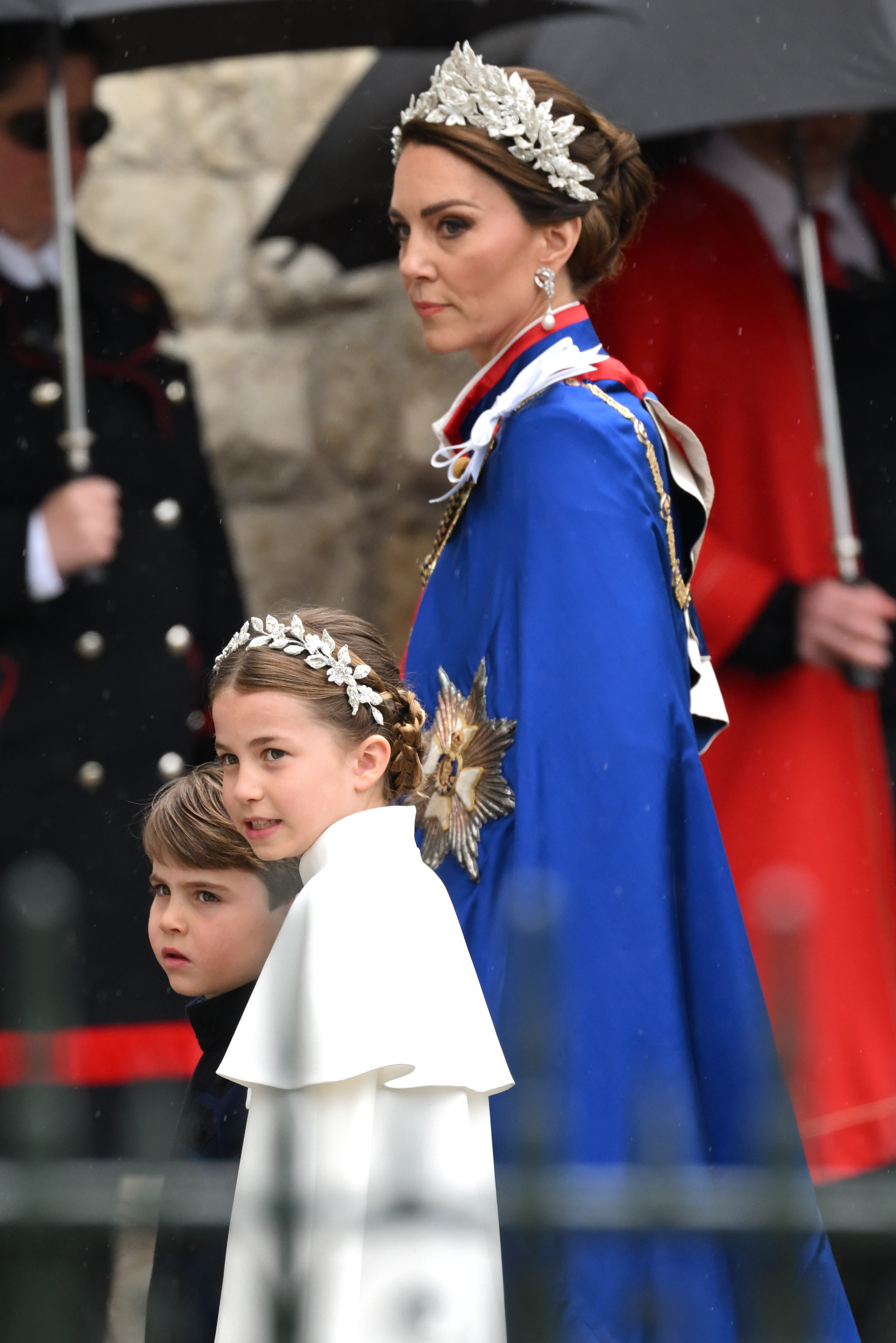 Catherine, Princess of Wales, Prince Louis and Princess Charlotte arrive at Westminster Abbey for the Coronation of King Charles III and Queen Camilla on May 06, 2023 in London, England.