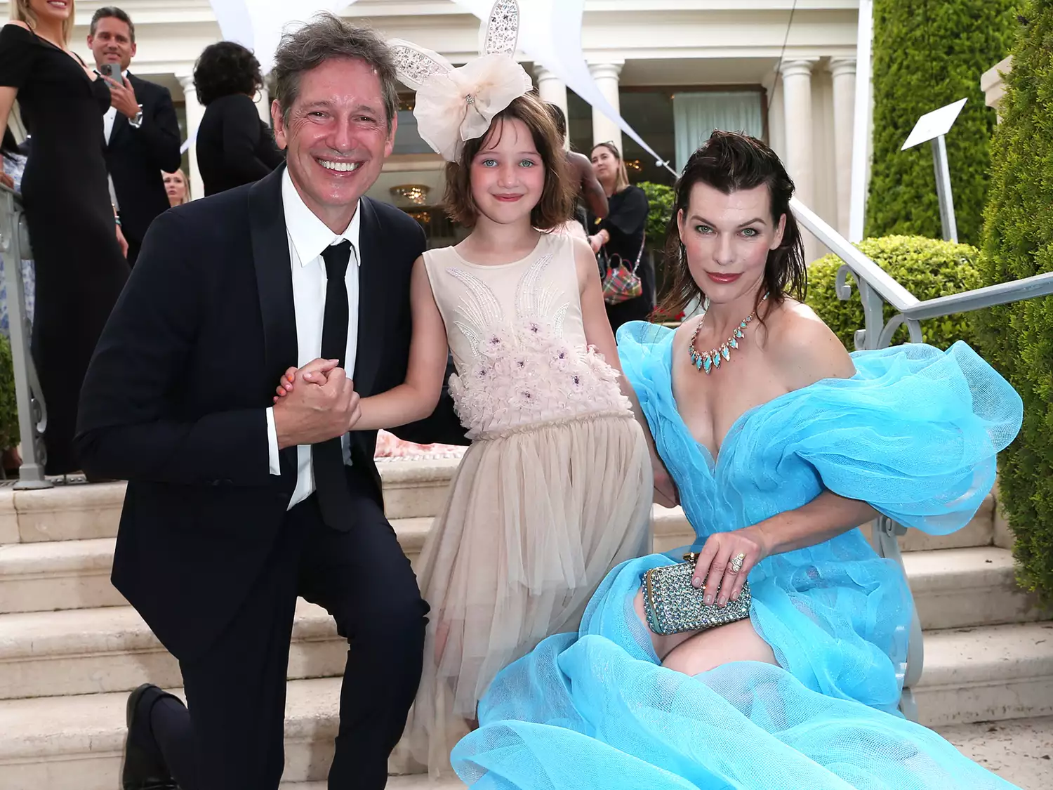 Paul W. S. Anderson, Dashiel Anderson and Milla Jovovich attend the amfAR Cannes Gala 2022 at Hotel du Cap-Eden-Roc on May 26, 2022 in Cap d'Antibes, France