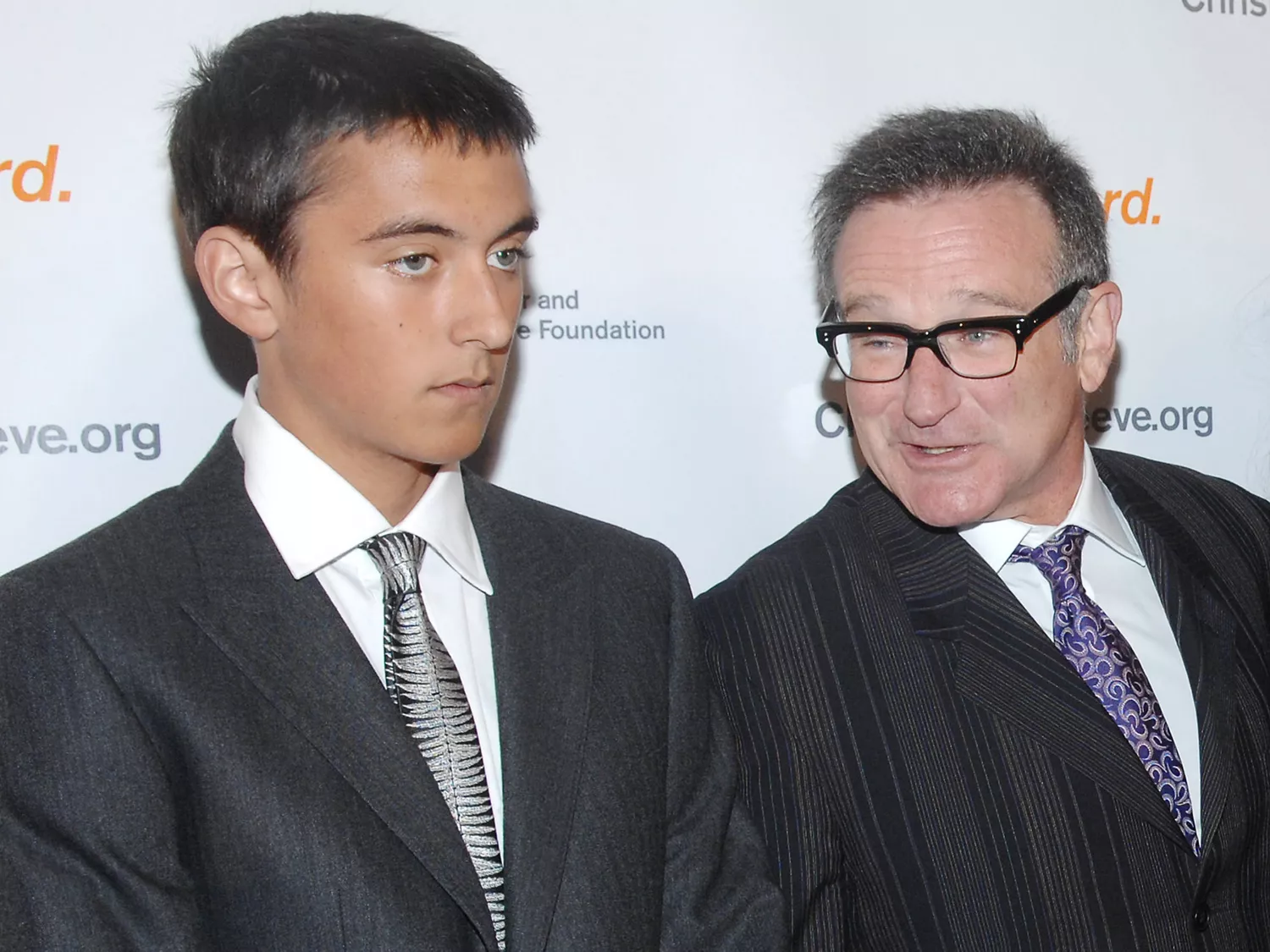 Cody Williams and actor Robin Williams attend "A Magical Evening" 