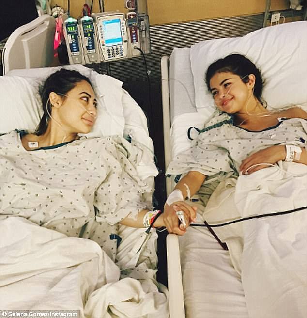 Bonded: In September, Selena shared a photo of her and 'beautiful friend' holding hands in their hospital beds as she revealed Francia had donated her kidney to her  