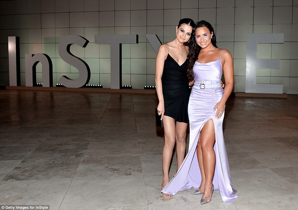 Making nice: The former frenemies, who had a very public falling out a couple of years ago, even posed together at the event held at LA's Getty Center