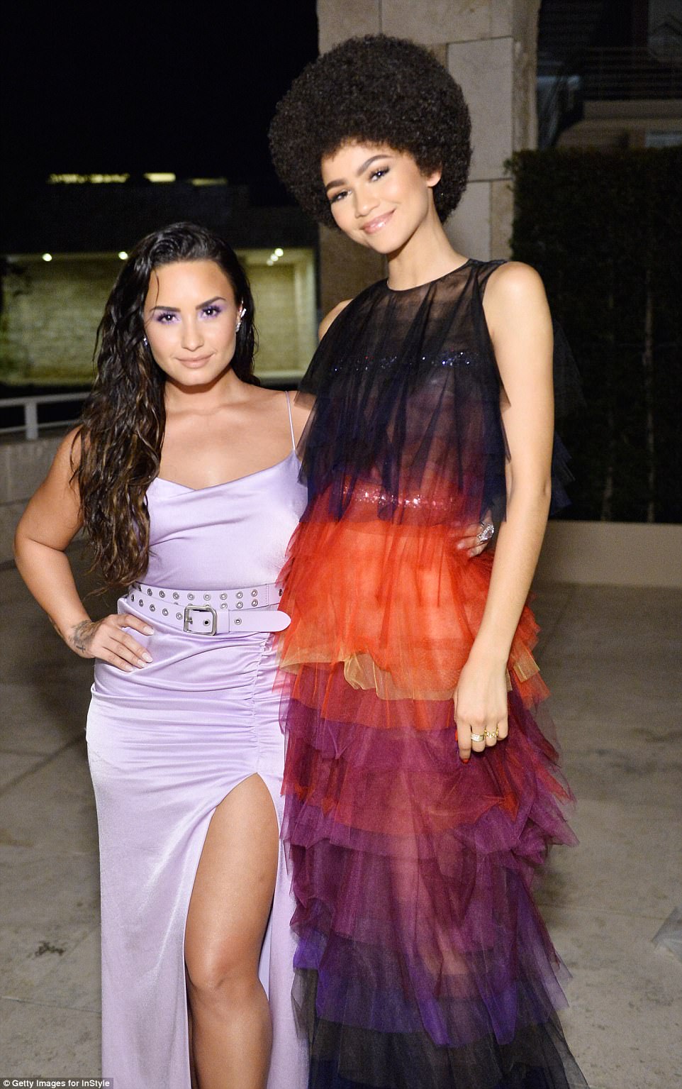 Shimmer goddesses: Demi and Zendaya dazzled in their colourful eye-catching gowns as they posed together 