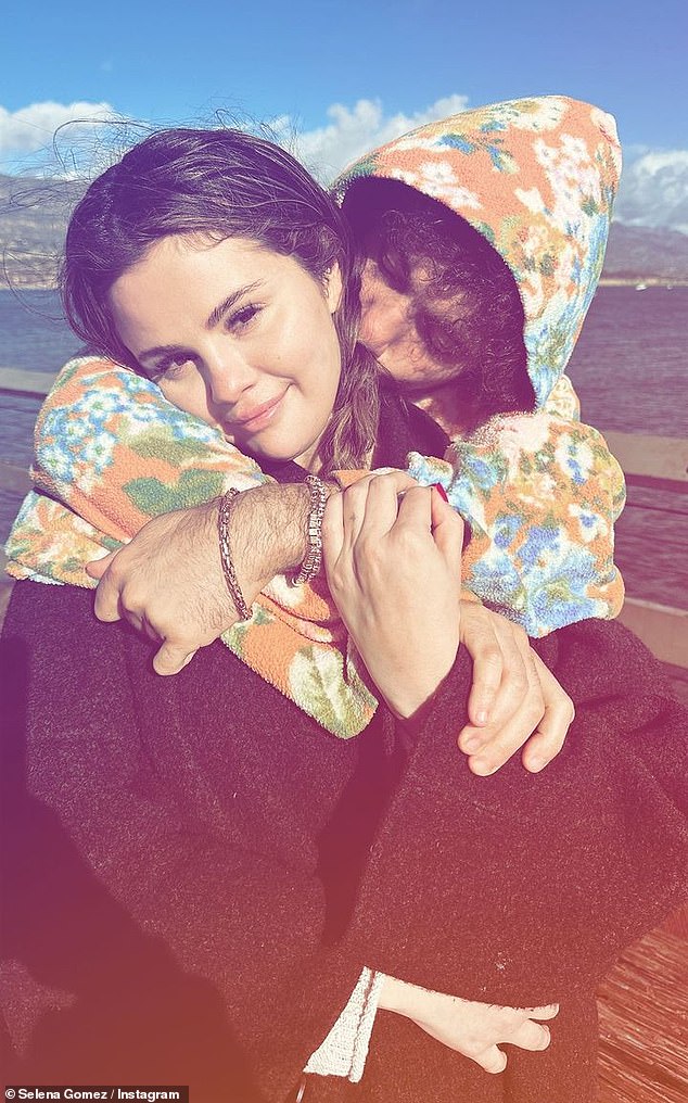 Selena Gomez, 31, shared a new loved-up snap with boyfriend Benny Blanco, 35, to her Instagram Stories on Saturday, showing him kissing her neck