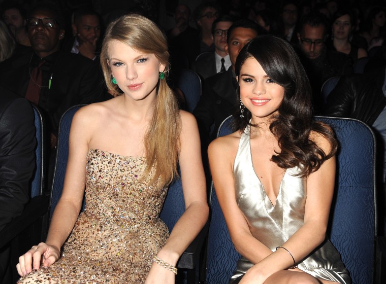 Taylor Swift and Selena Gomez in the audience at the 2011 American Music Awards at the Nokia Theatre L.A. LIVE on November 20, 2011 in Los Angeles, California.