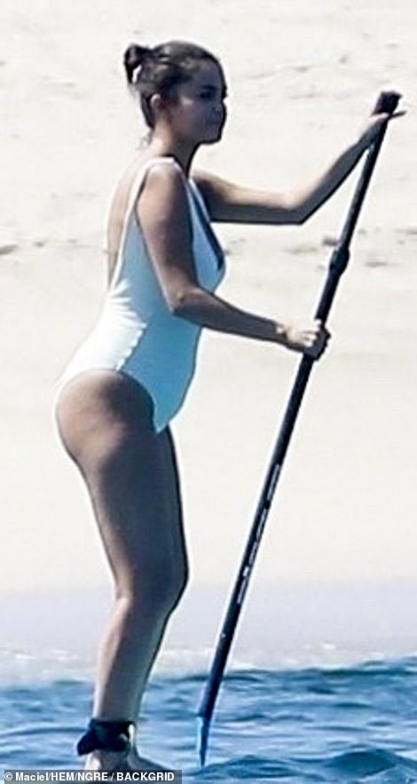 Balancing act: Selena was having a blast during the water activity