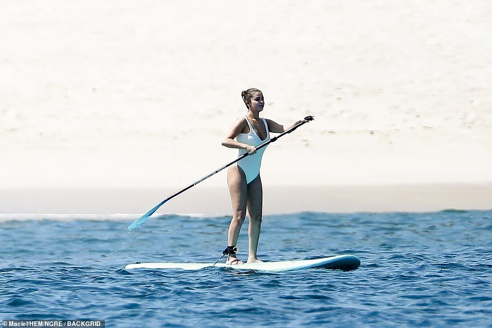 Fun in the sun: Selena certainly seemed to be enjoying her time in the ocean