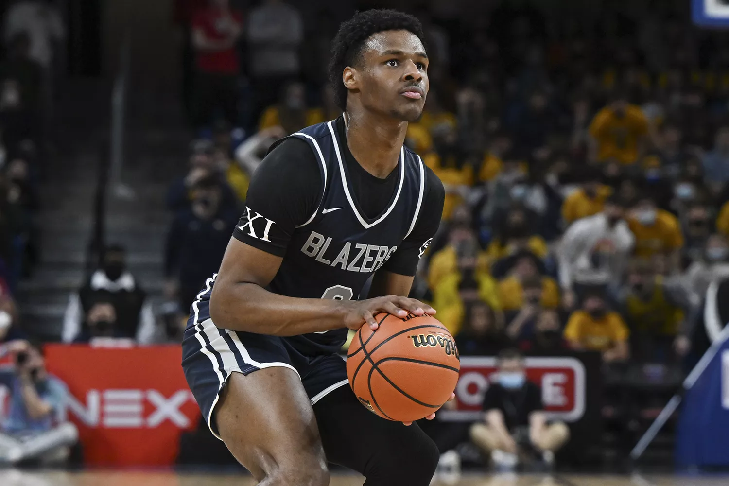 Bronny James #0 of Sierra Canyon (CA) shoots a three-point basket in the first half against Glenbard West (IL) at Wintrust Arena on February 5, 2022 in Chicago, Illinois