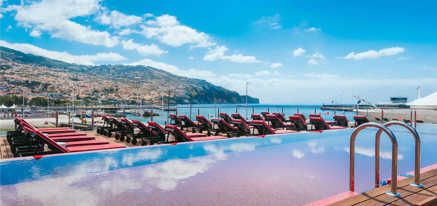 The Pestana CR7 Funchal is located on the waterfront and boasts views of Madeira's mountainous landscape