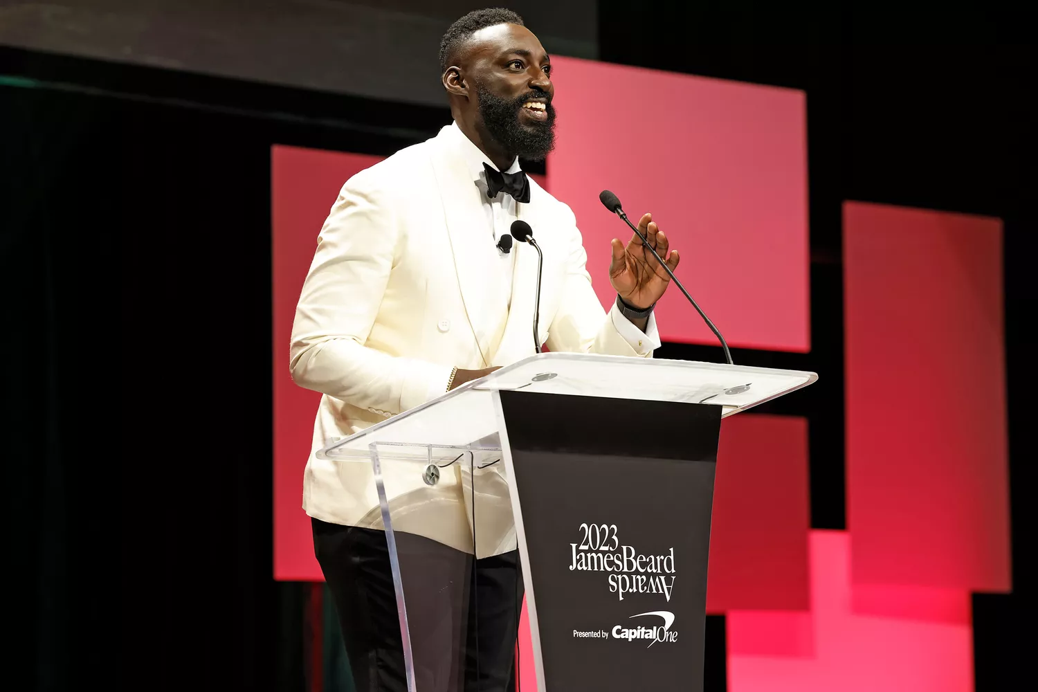 Eric Adjepong speaks onstage at the 2023 James Beard Restaurant And Chef Awards