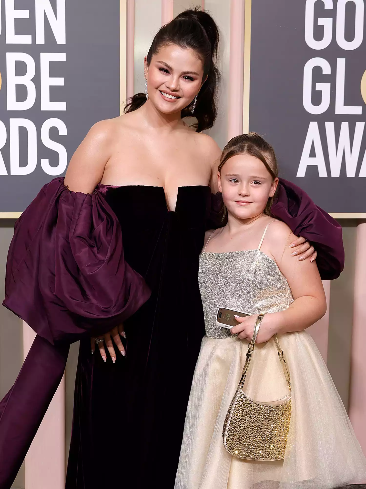 Selena Gomez and Gracie Elliot Teefey attend the 80th Annual Golden Globe Awards