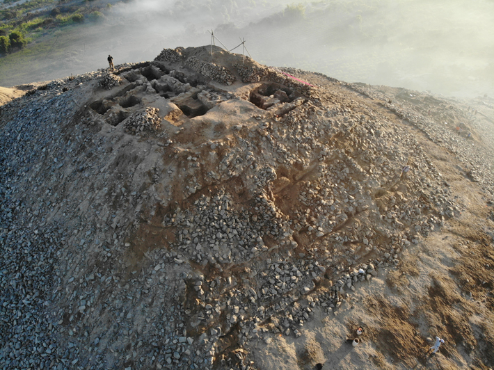 This aerial photo shows the summit of Cerro San Isidro, where archaeologists excavated offerings and other evidence of ritual activity. (D. Chicoine)