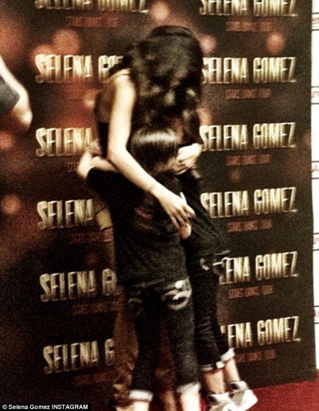 Happy star: Selena shared an Instagram photo of herself sharing a hug with fans in Texas