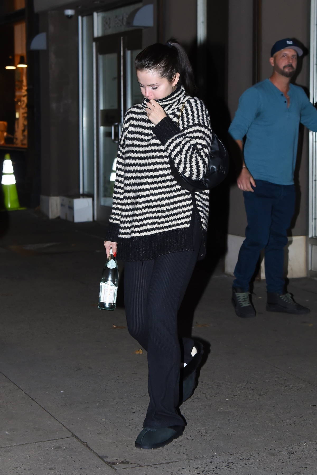 selena gomez keeps cozy in a striped knitted sweater and black trousers while leaving the electric lady studio in new york city-291122_5