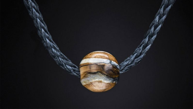 The bead on this bracelet, from Portland-based design company William Henry, is actually <a href="http://edition.cnn.com/2016/03/29/luxury/dinosaur-bone-accessories/">made</a> using fossilized mammoth tooth and dinosaur bones.