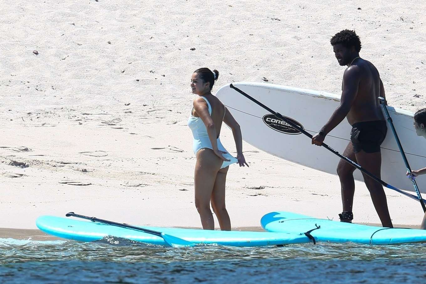 Selena Gomez 2019 : Selena Gomez in White Swimsuit Paddleboarding-05