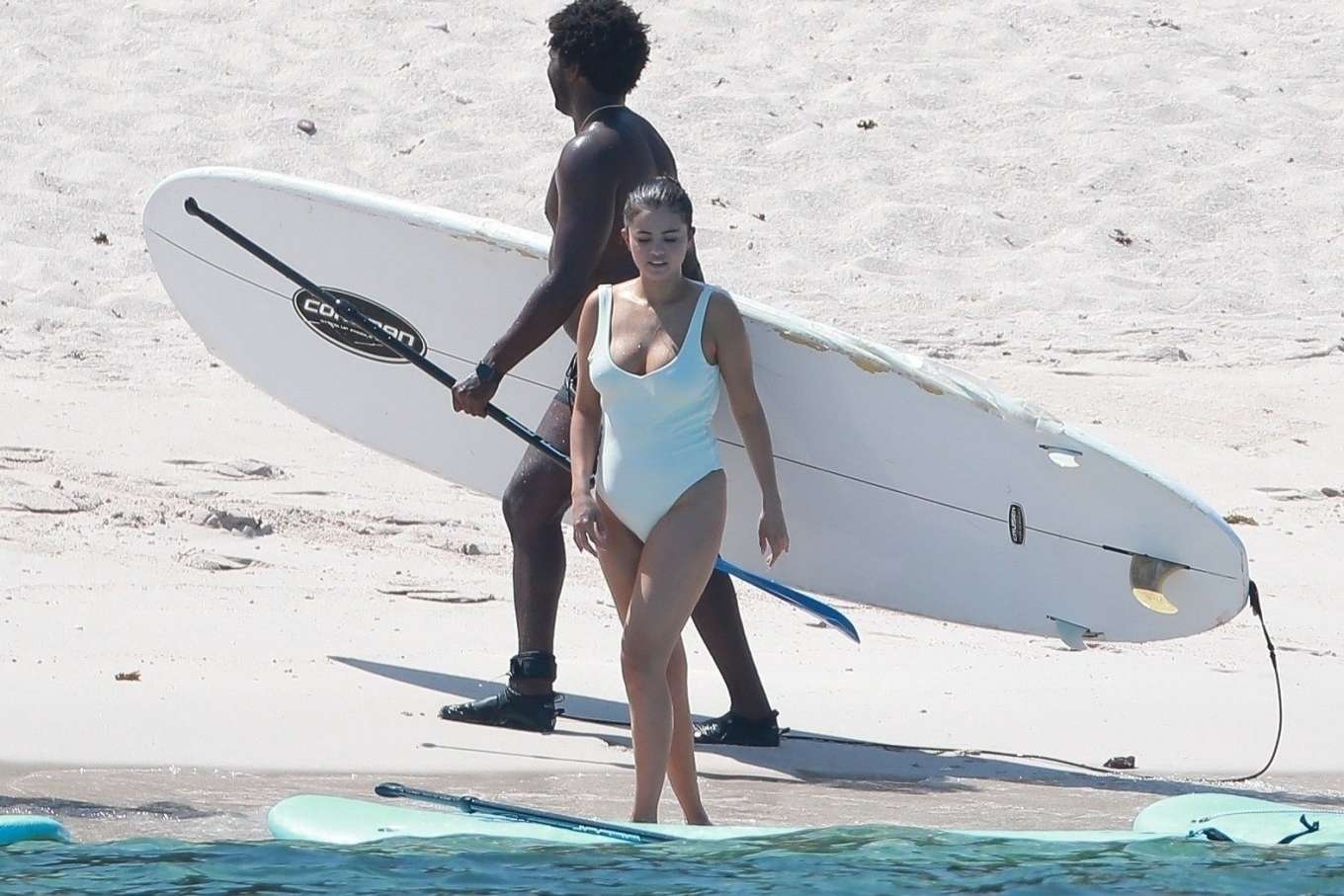 Selena Gomez 2019 : Selena Gomez in White Swimsuit Paddleboarding-55