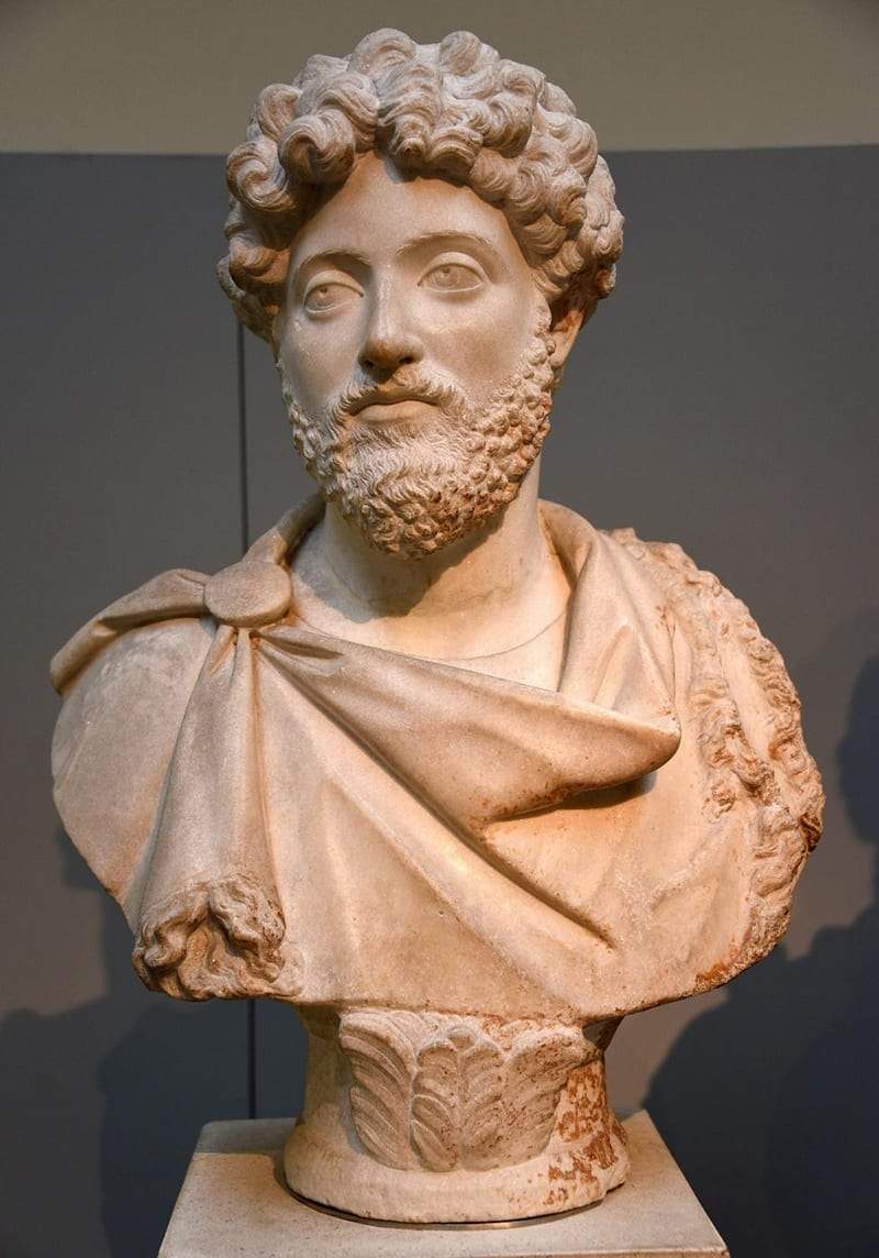 Marble bust of the Roman Emperor Marcus Aurelius in a fringed cloak in The British Museum, London.