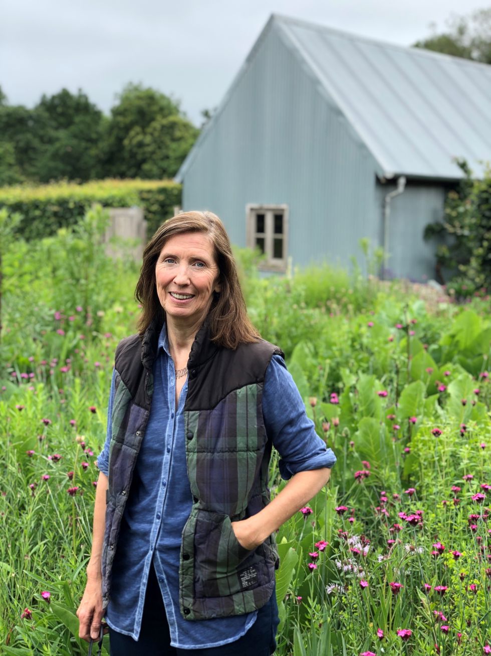 sue stuart smith in barn garden