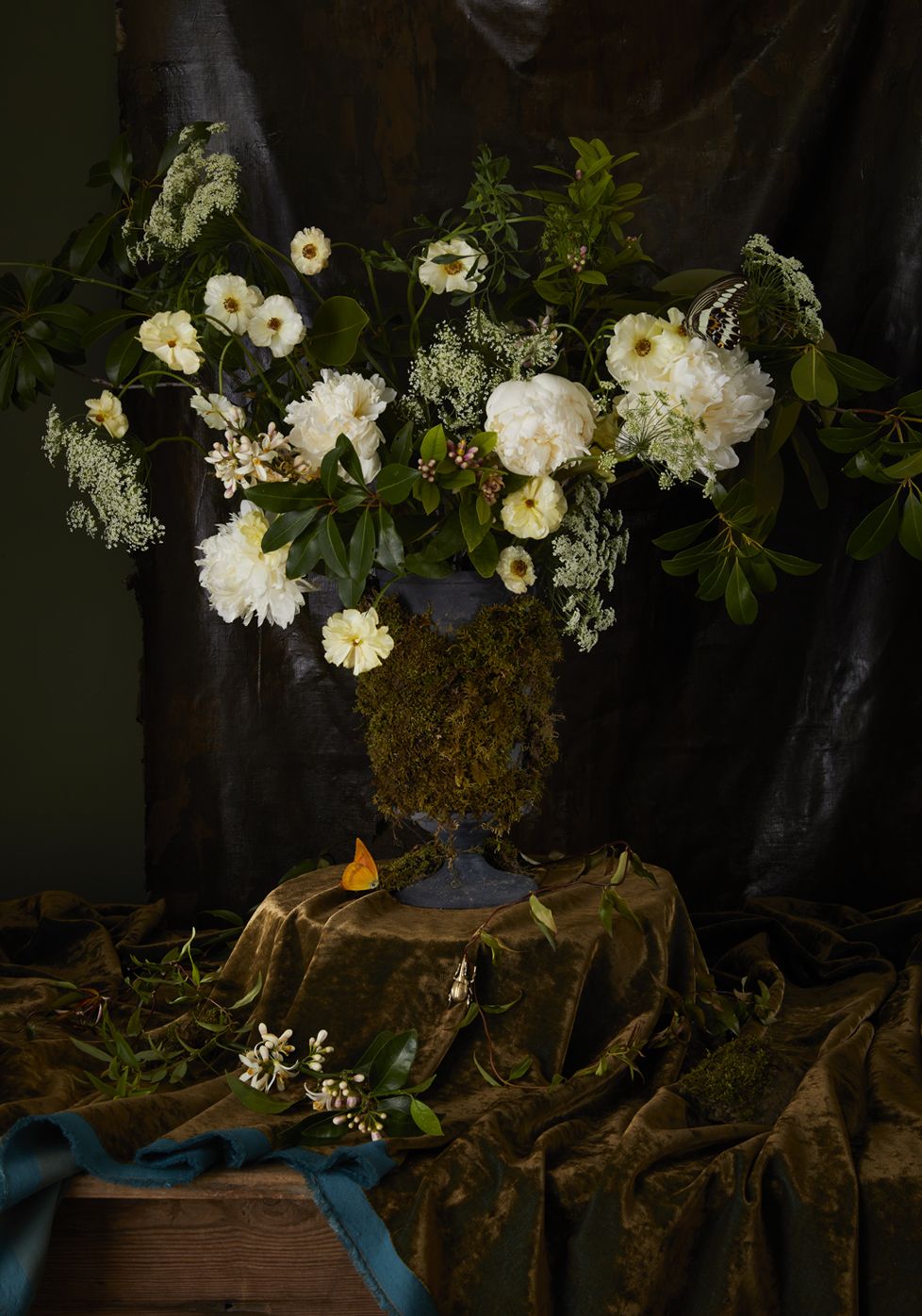 a vase with white flowers